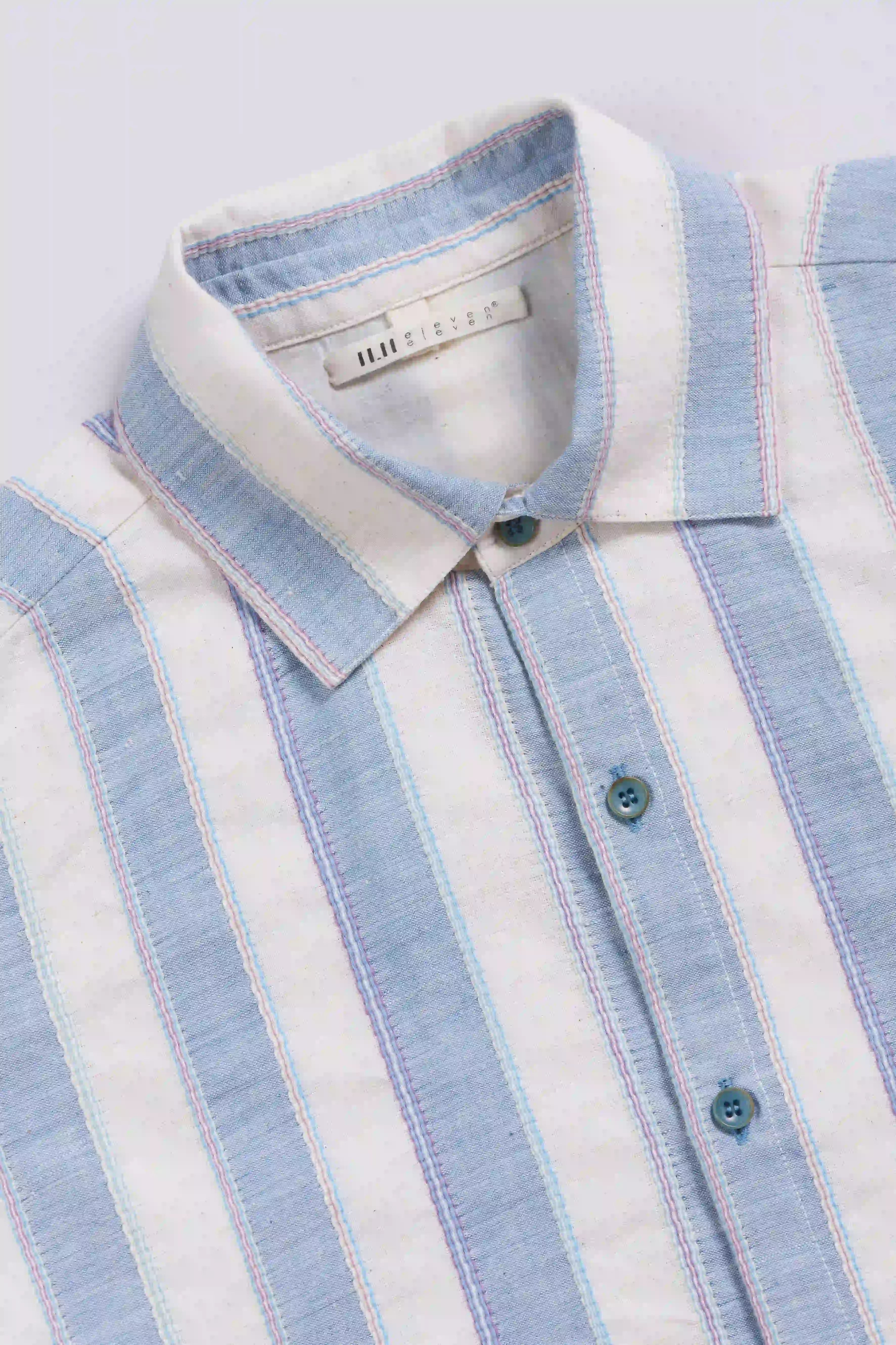 Fabric close-up with collar and buttons