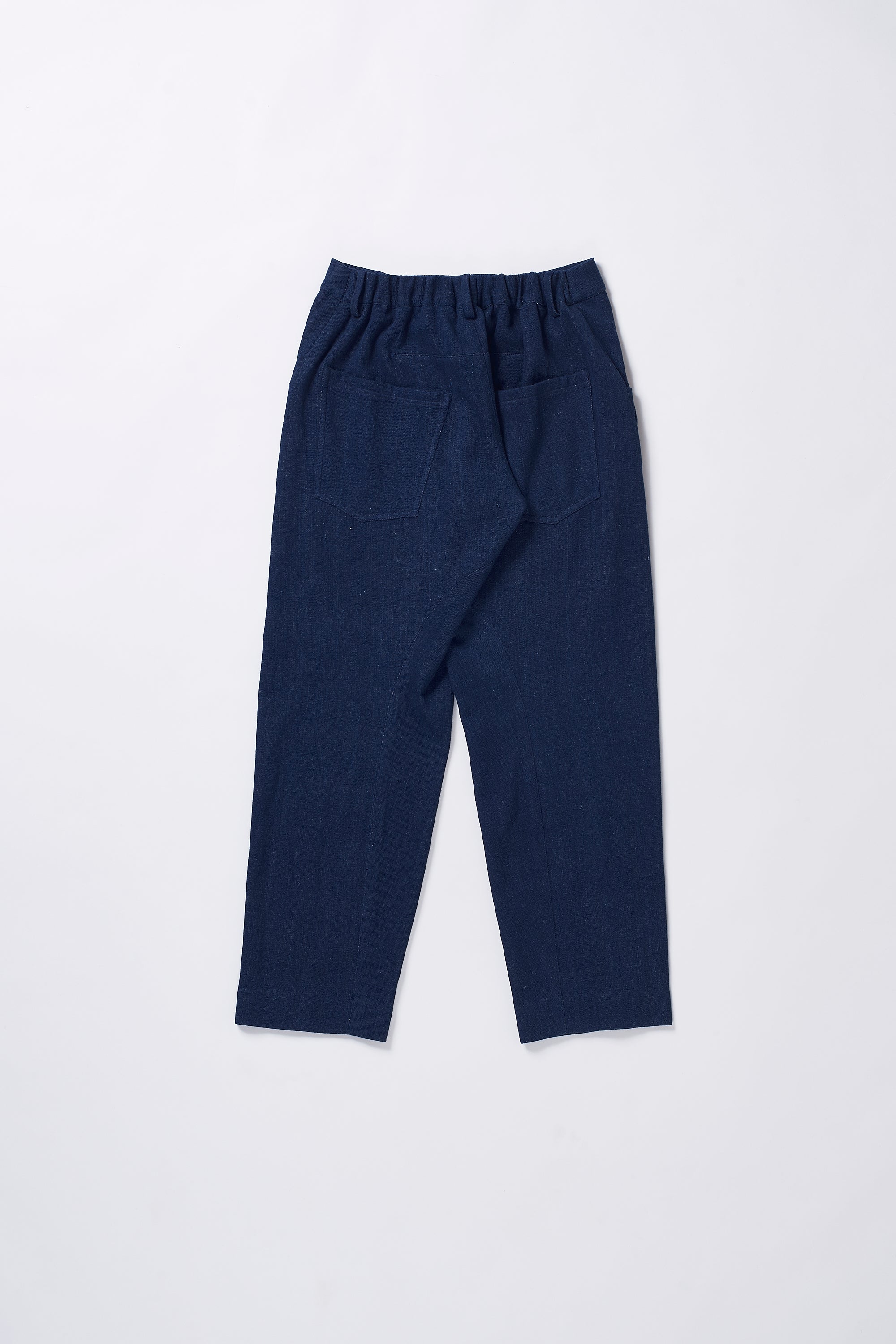 ELASTICATED ENGINEERED HAND-WOVEN INDIGO DENIM TROUSERS