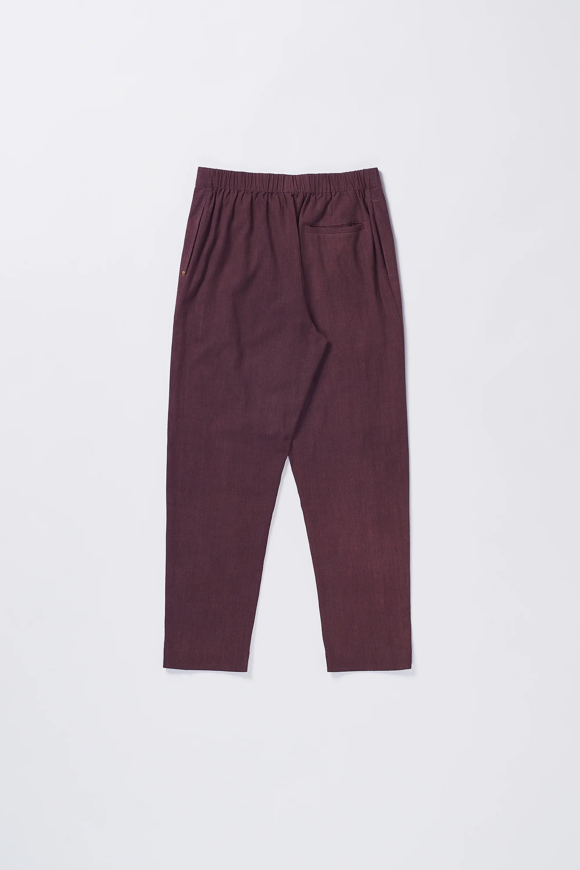 TAPERED FIT TROUSERS IN PURPLE RED