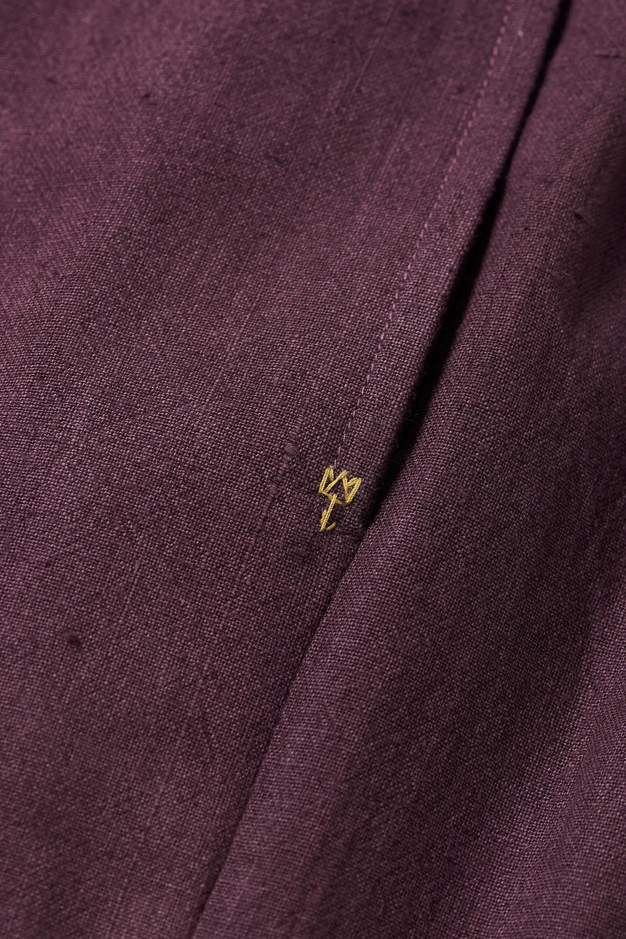 TAPERED FIT TROUSERS IN PURPLE RED