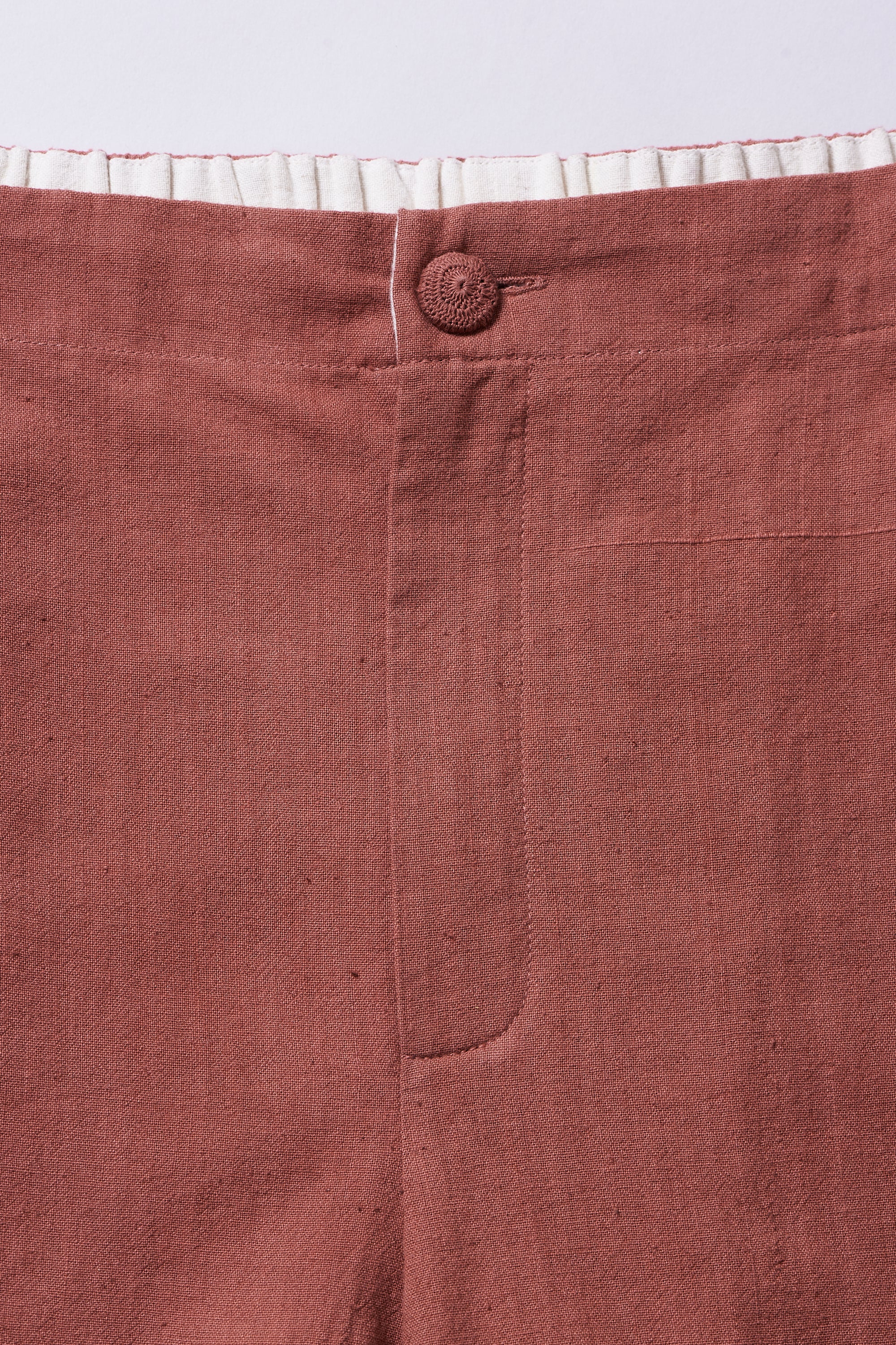 TAPERED FIT TROUSERS IN ROUGE PINK