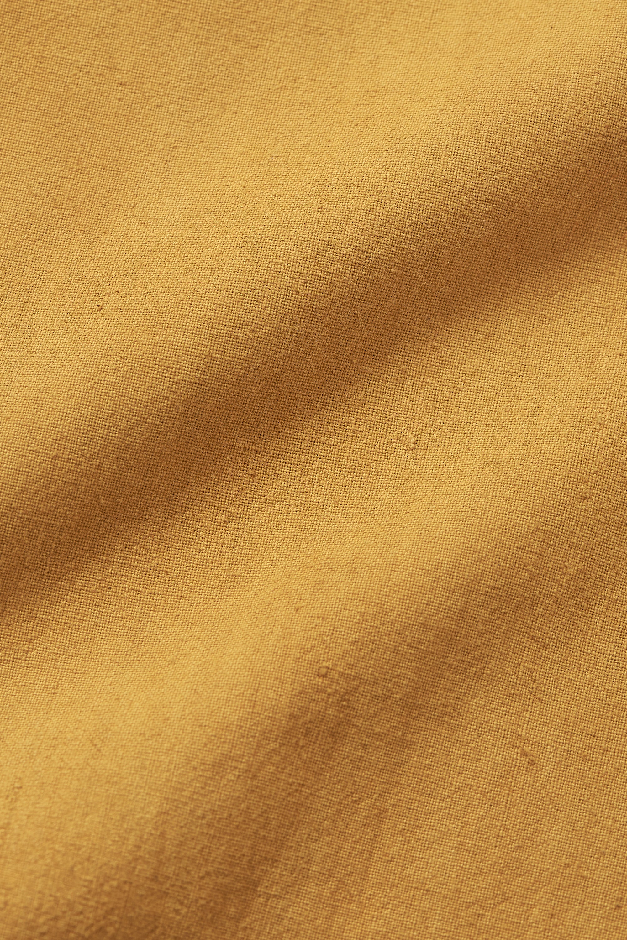 TAPERED FIT TROUSERS IN MUSTARD YELLOW