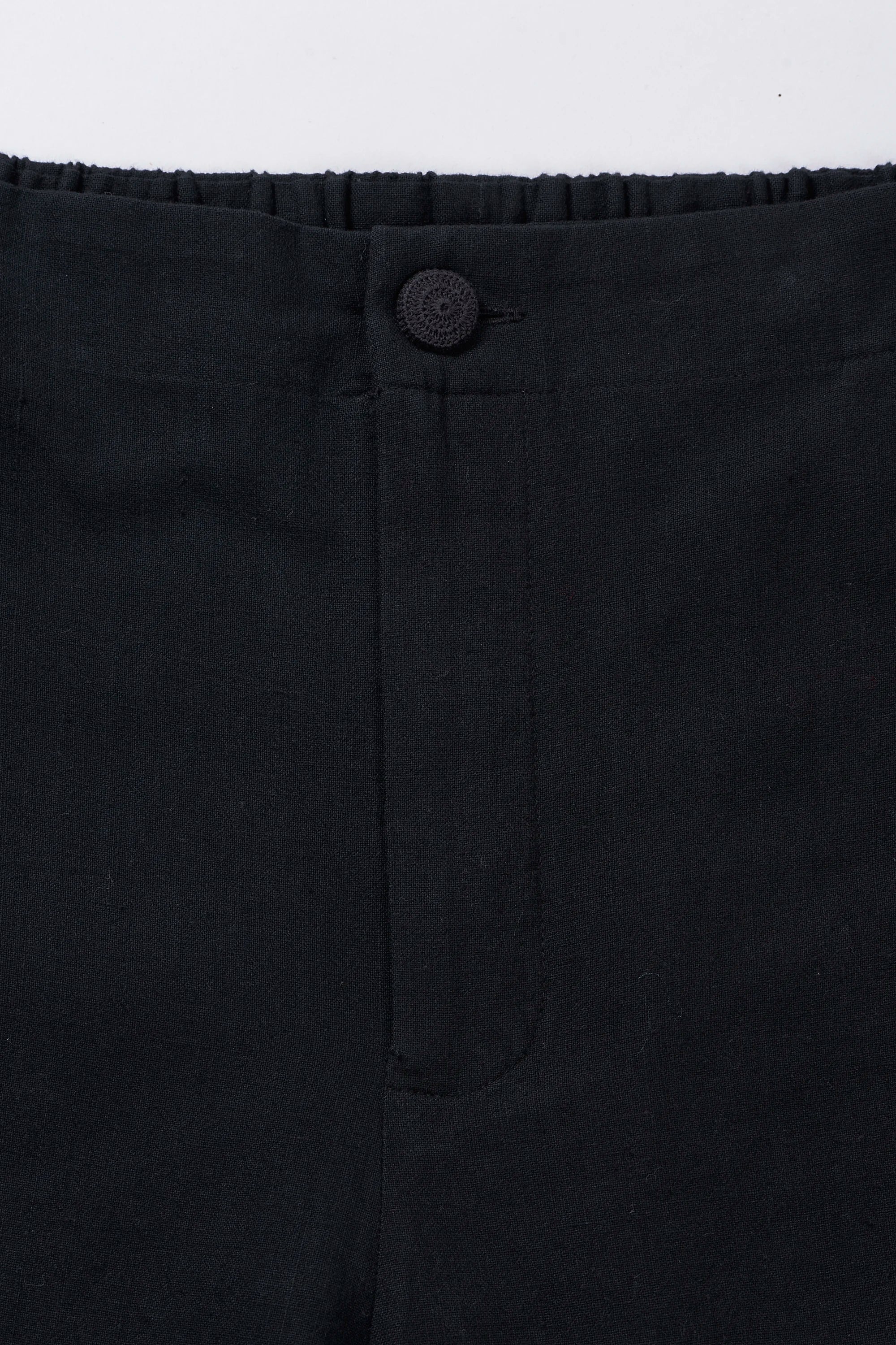 TAPERED FIT TROUSERS IN BLACK