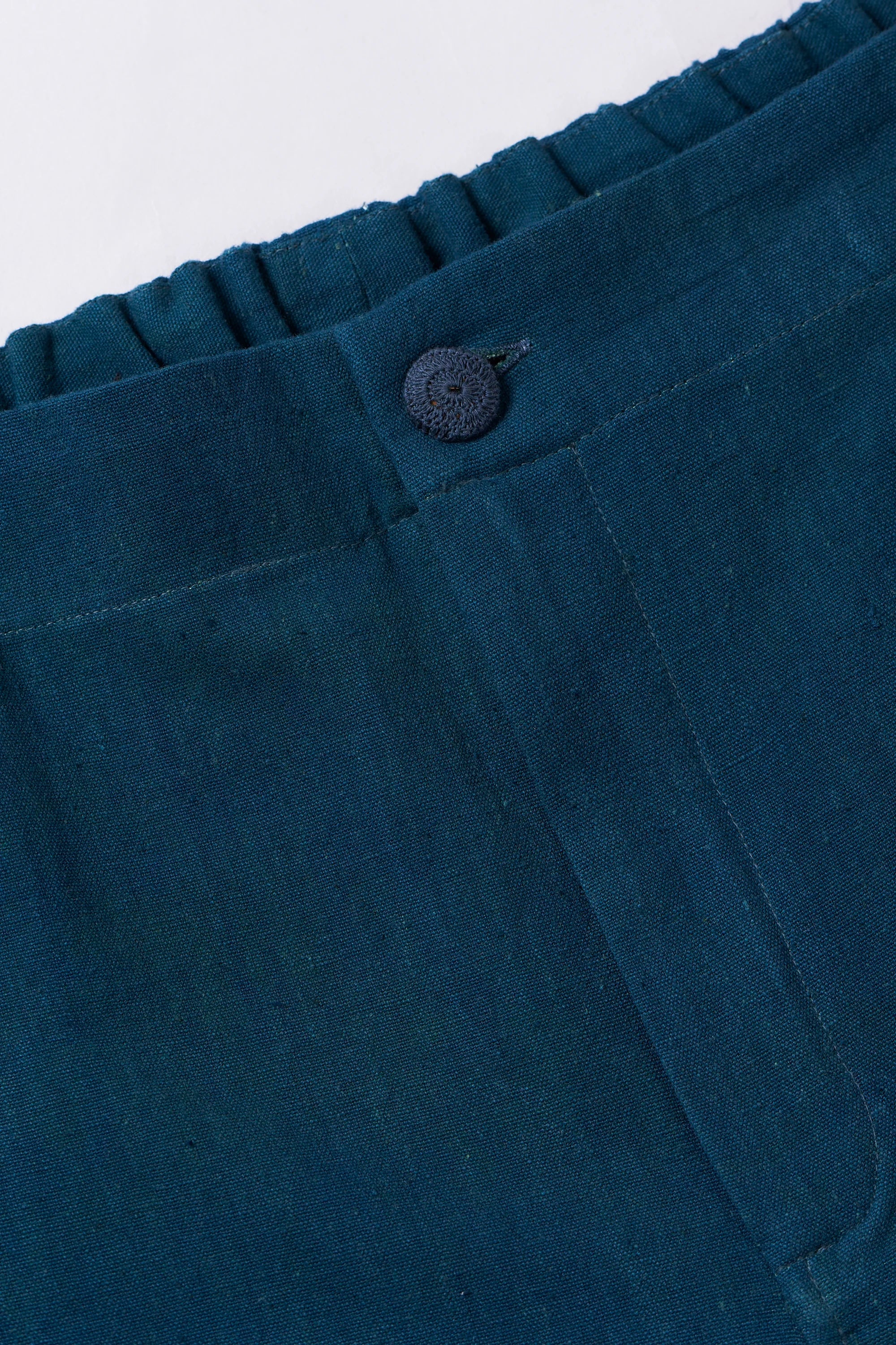 BOTTLE GREEN TAPERED FIT TROUSERS