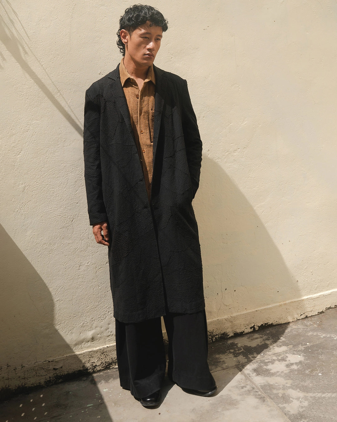 COMPOSED IN LONG COAT