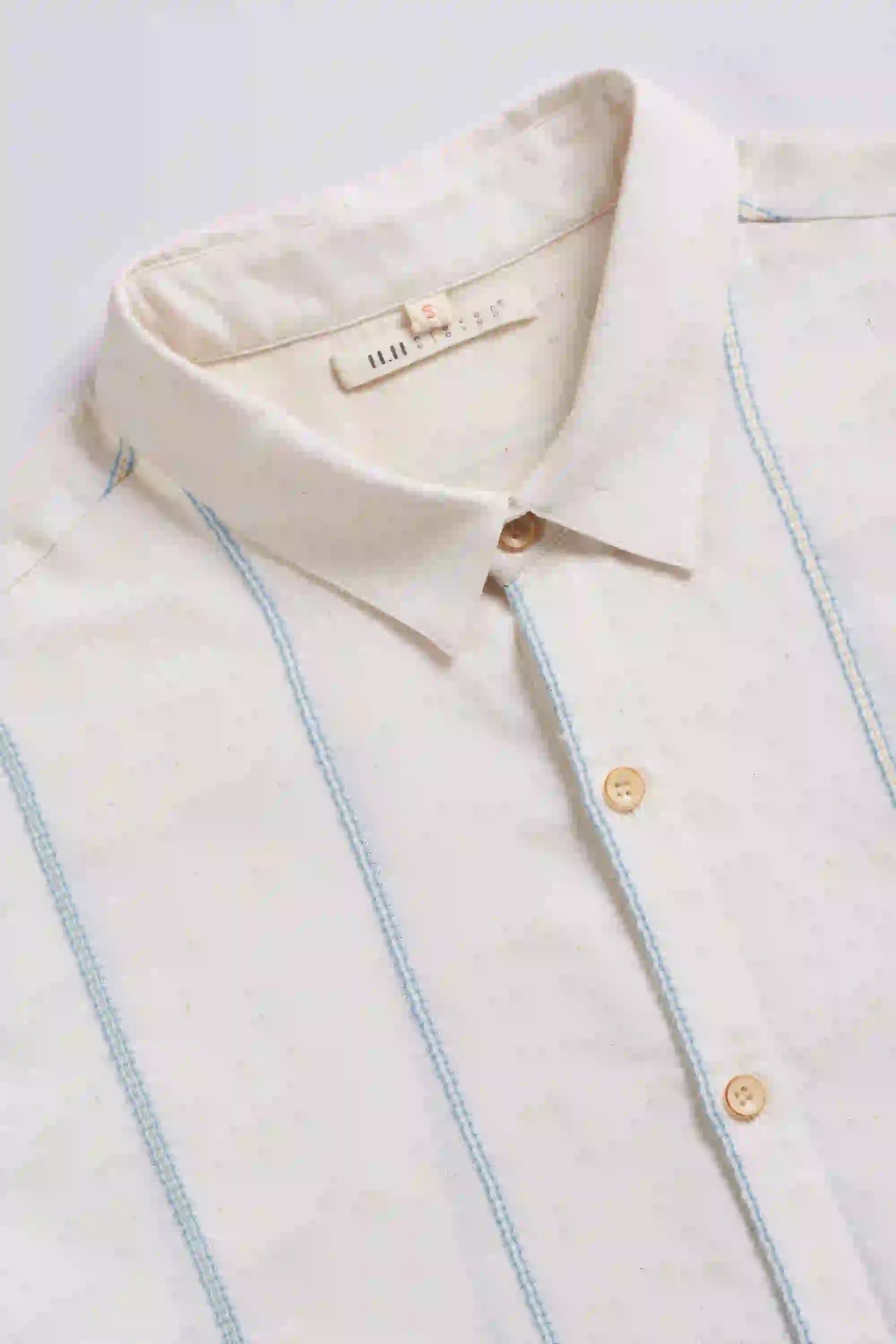 Fabric close-up with collar and buttons