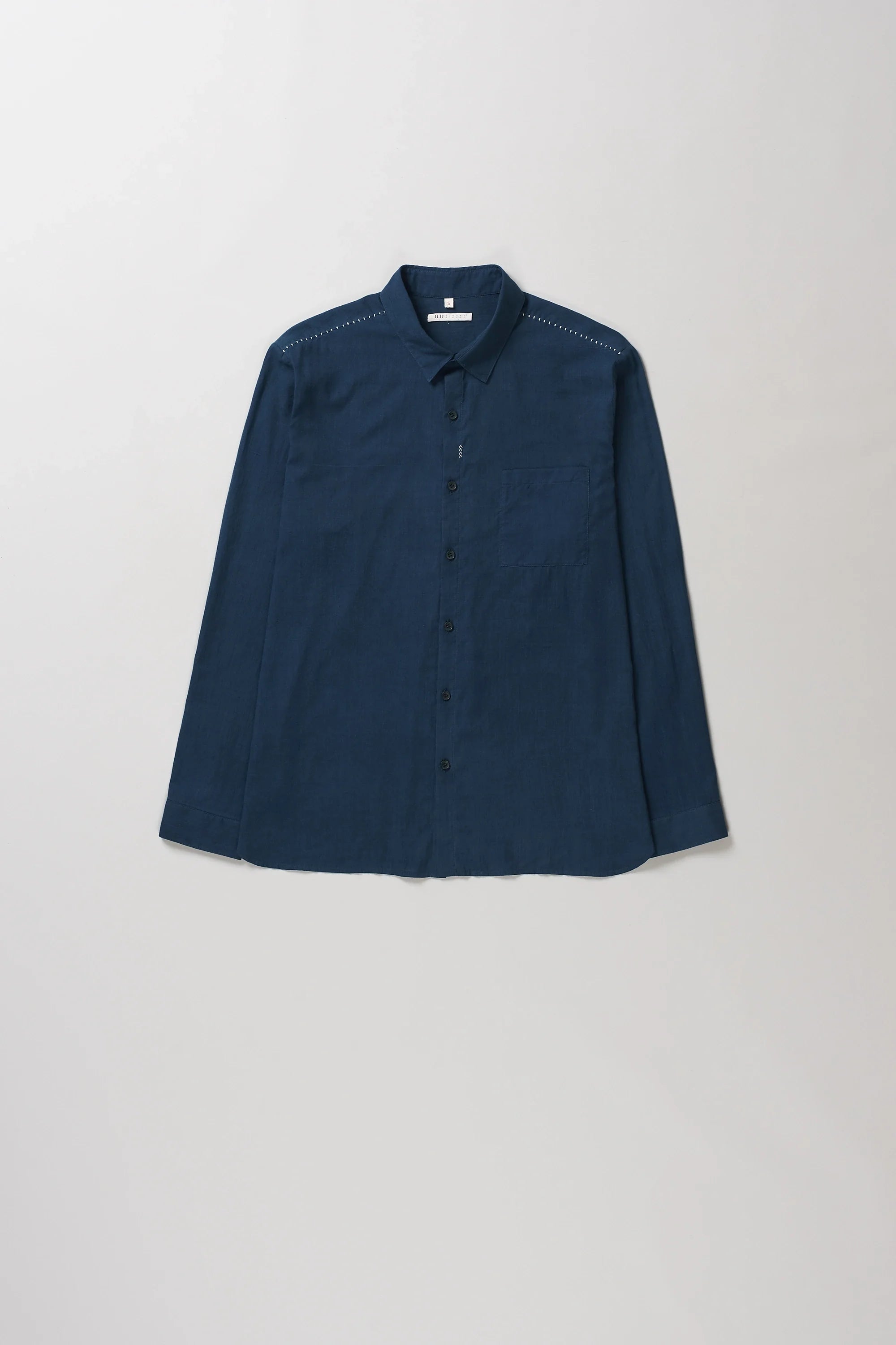Front image of space blue cotton shirt with hand details