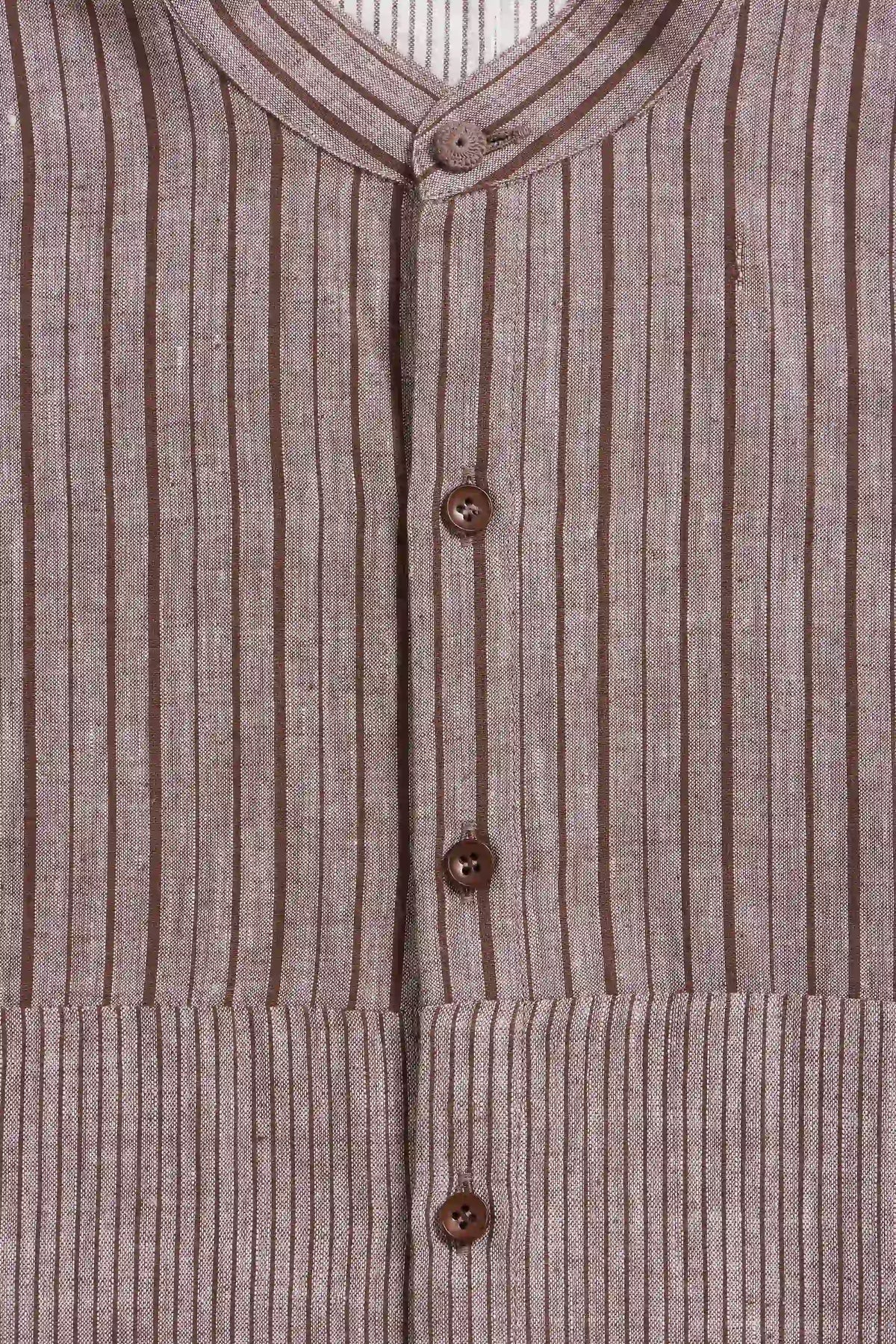 Close-up of a shirt, featuring a mandarin collar and three visible brown buttons.