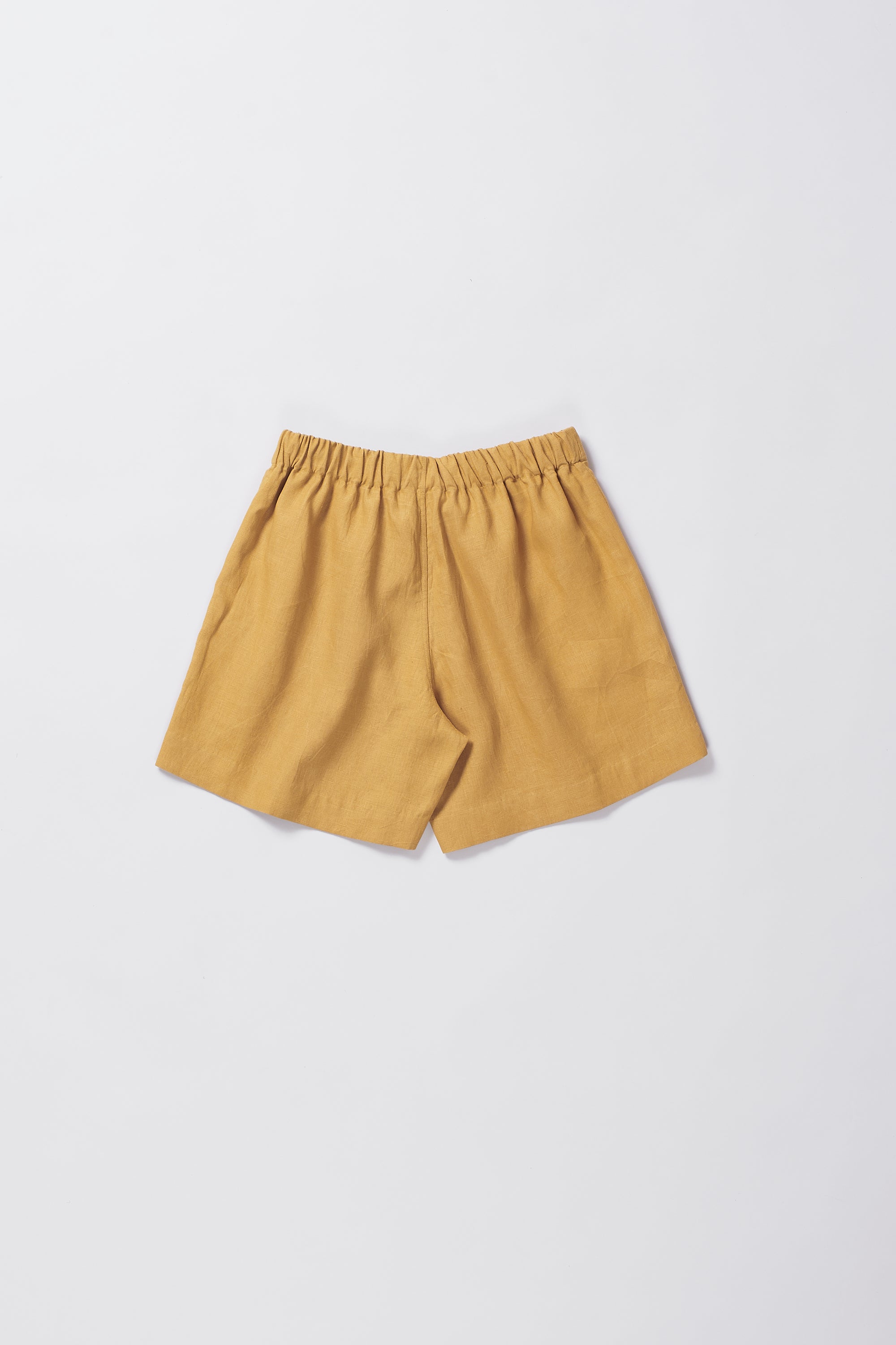 LINEN SHORTS IN MUSTARD YELLOW