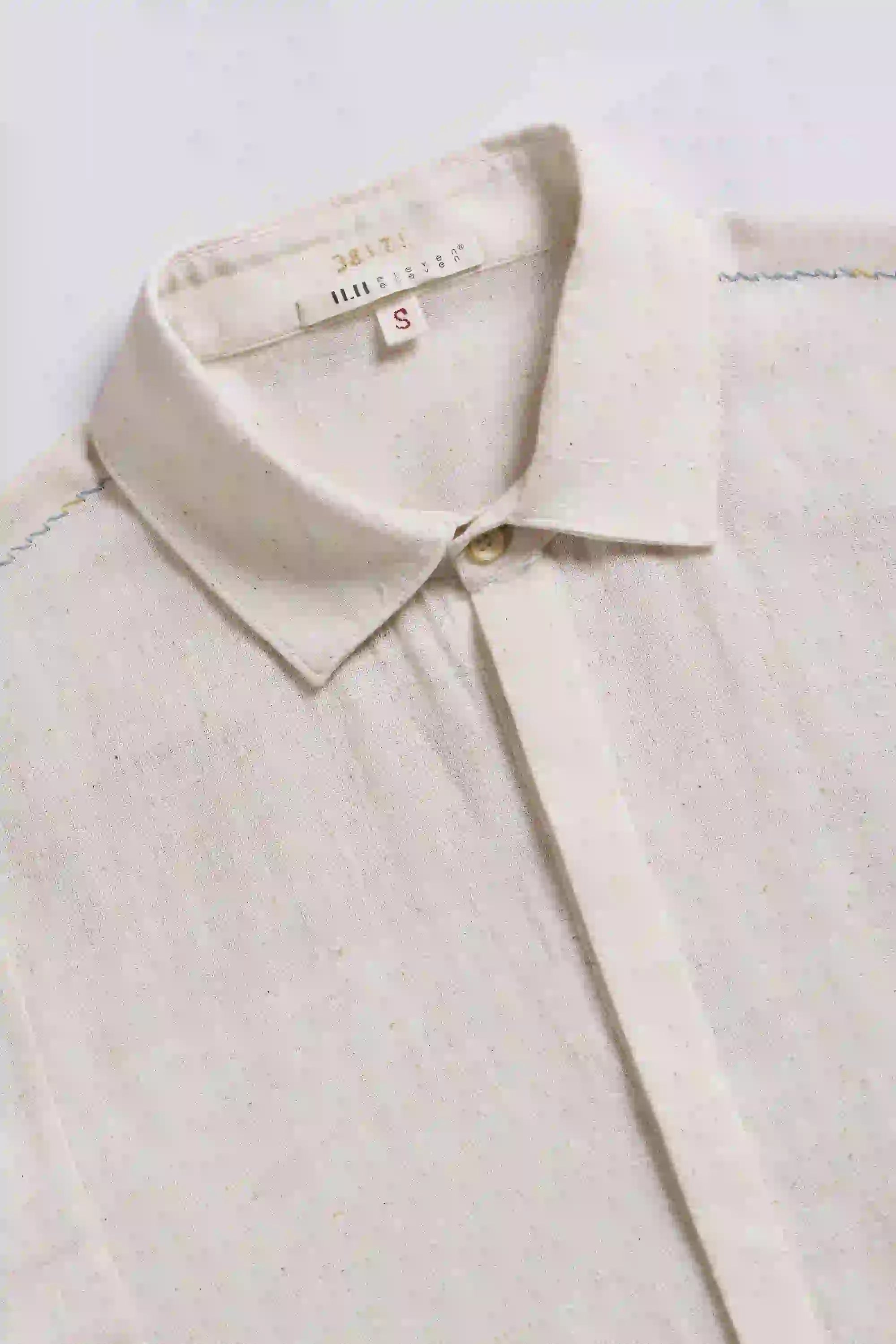 Fabric close-up with collar and buttons
