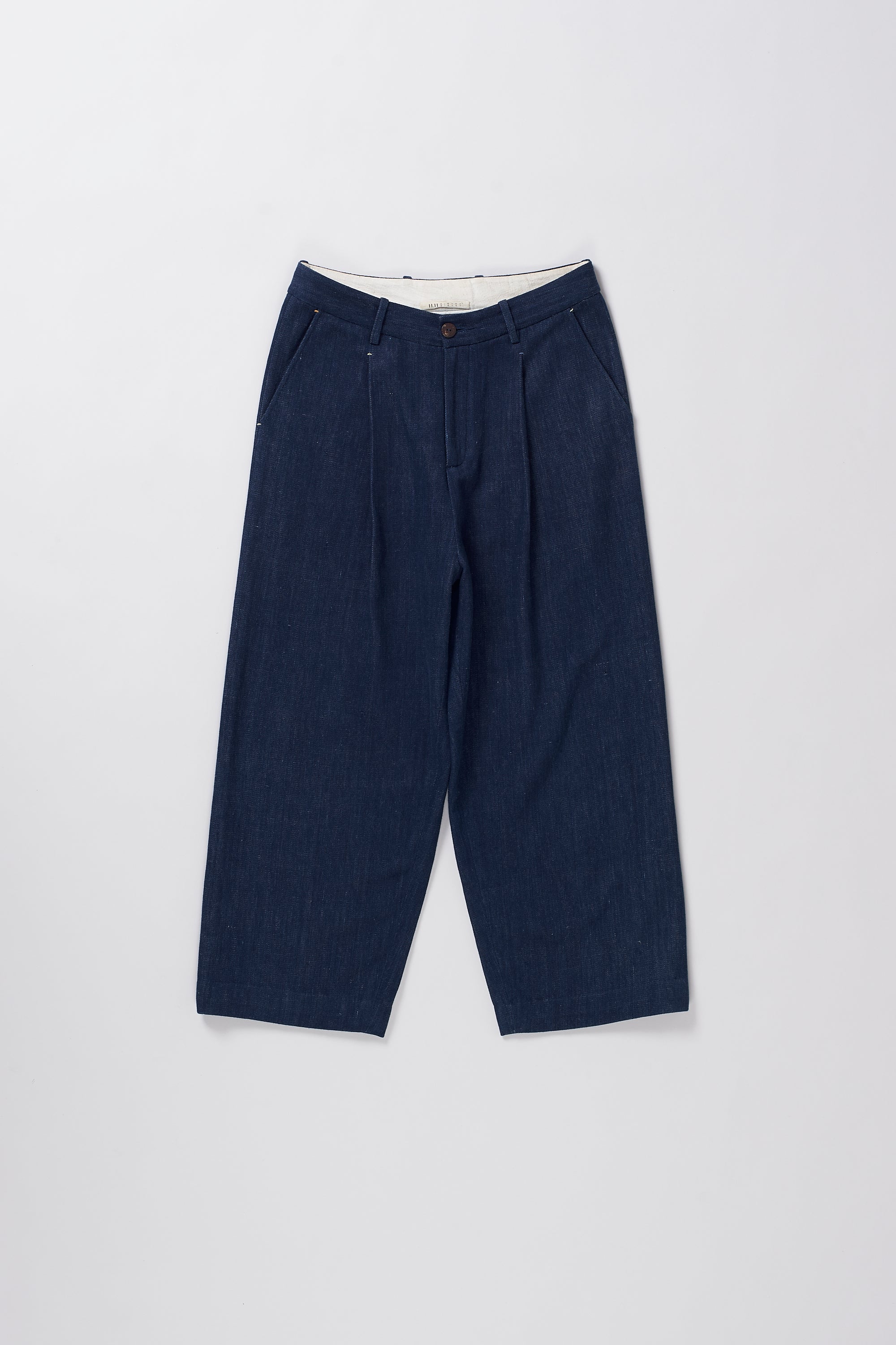 Front image of blue pants on a light grey background