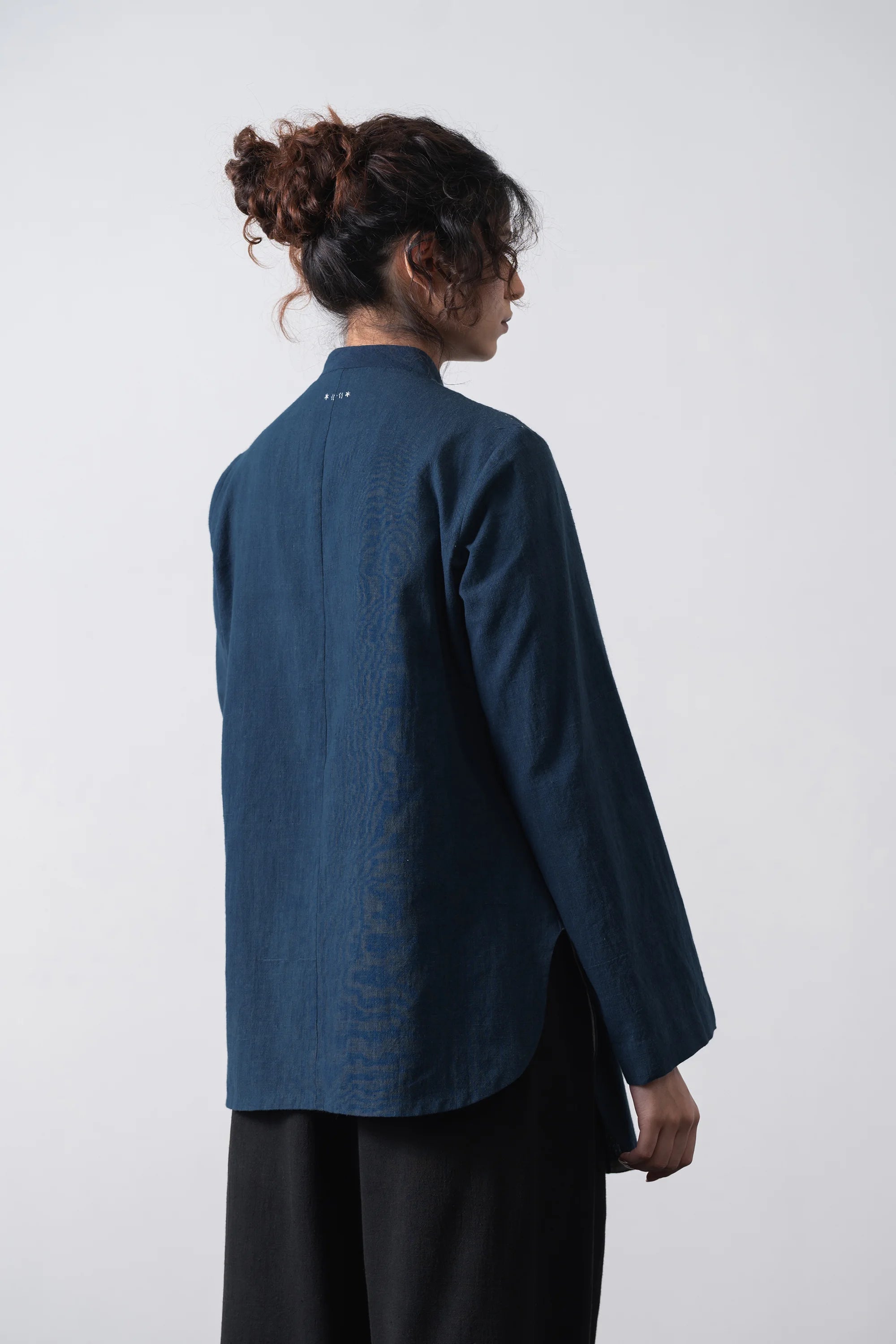 Back shot wearing cotton space blue shirt