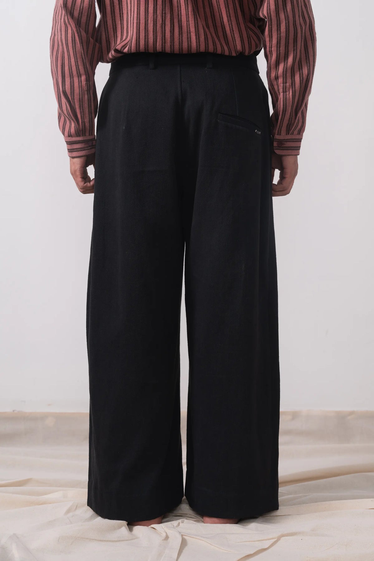 Relaxed Pleated Trousers in Black