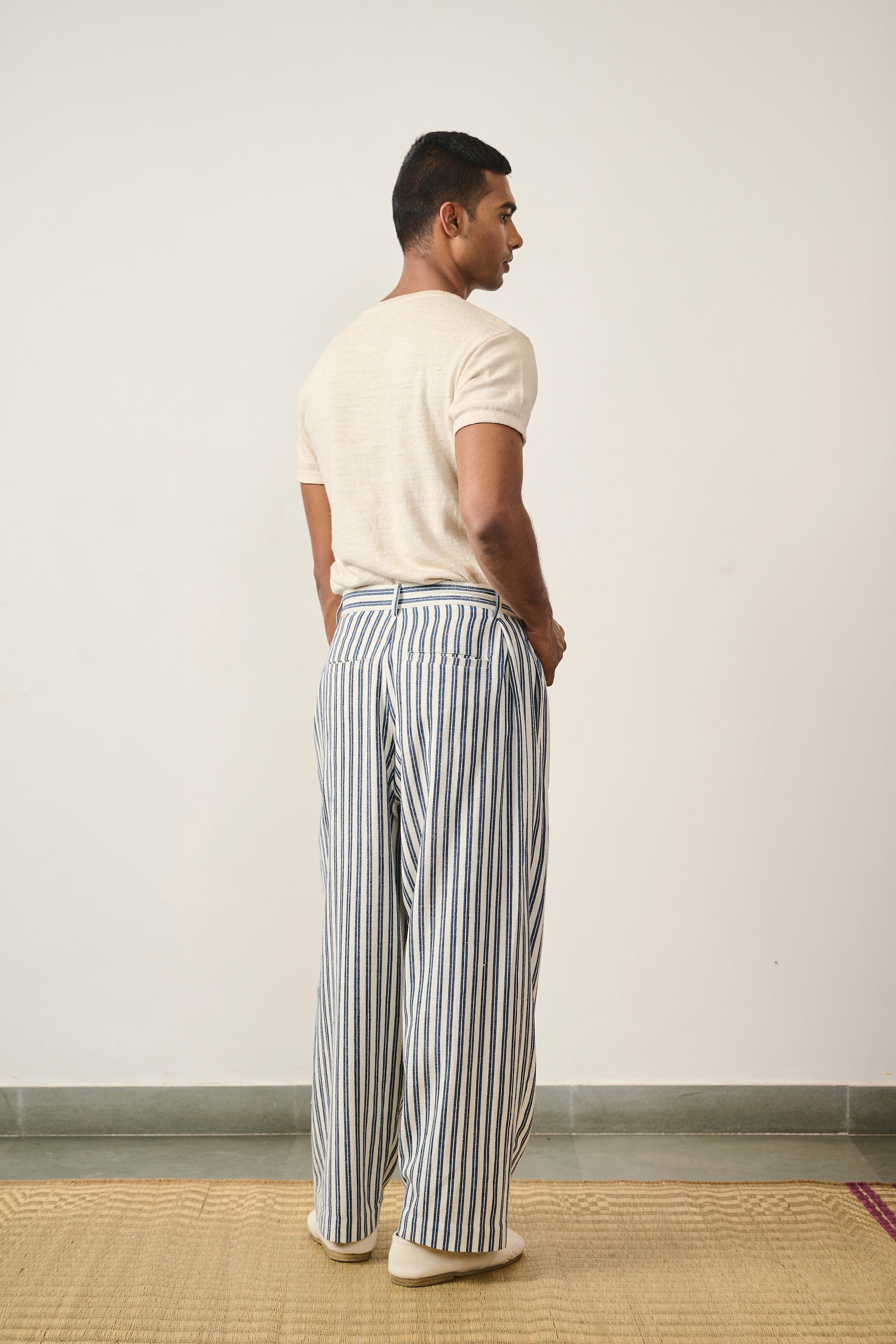 YARN DYED COTTON PLEATED TROUSER