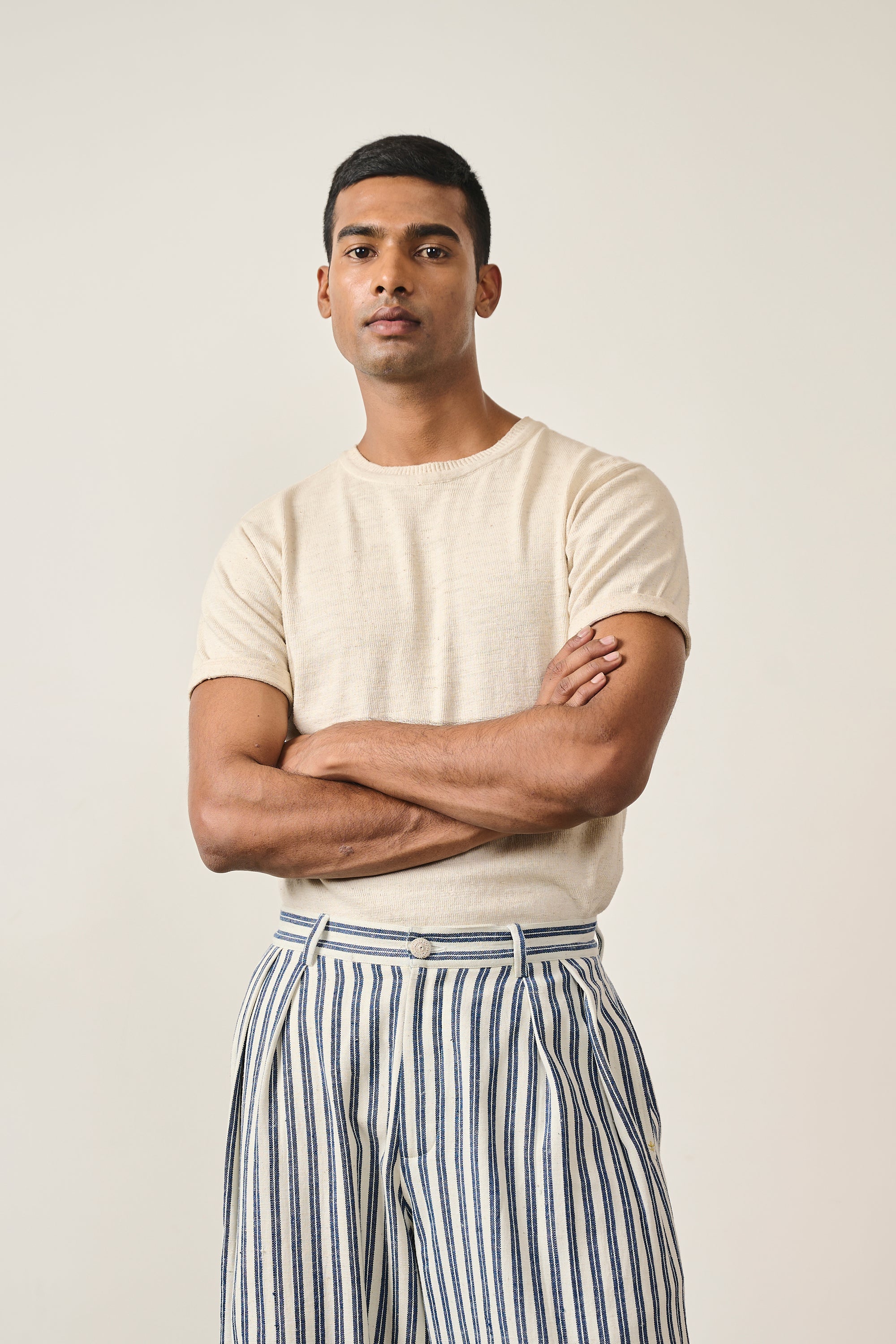 YARN DYED COTTON PLEATED TROUSER
