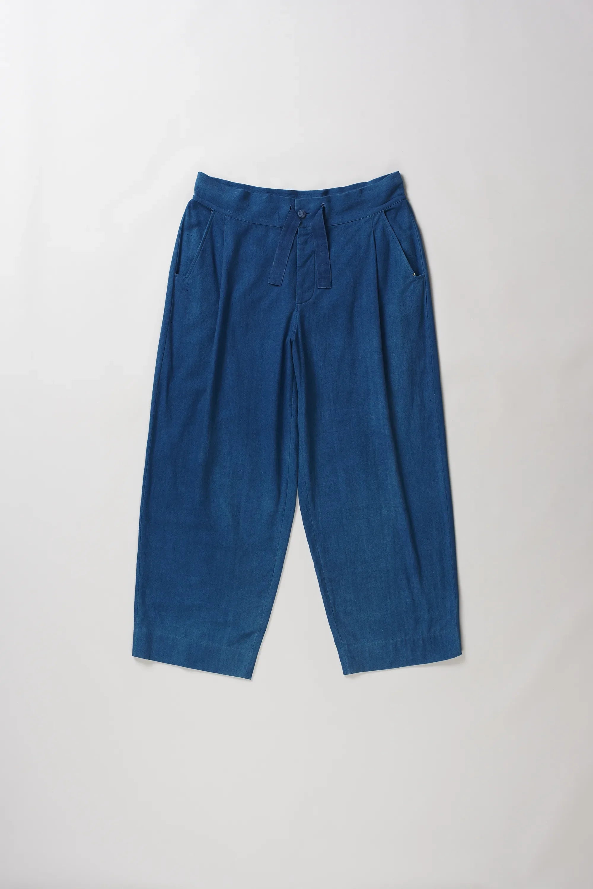 Front image of medium indigo cotton pant with drawstring