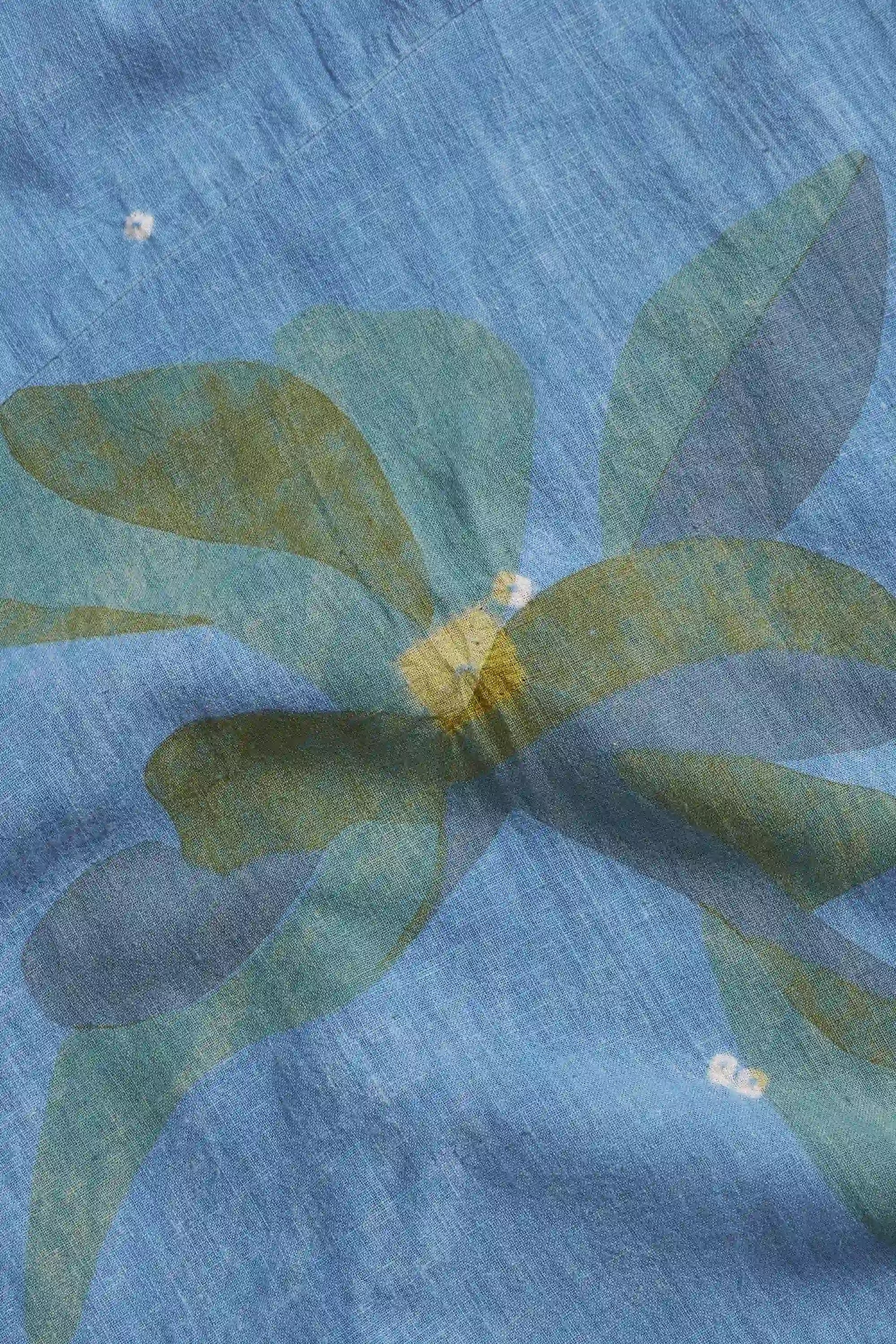 Close-up of a blue  fabric with hand paint