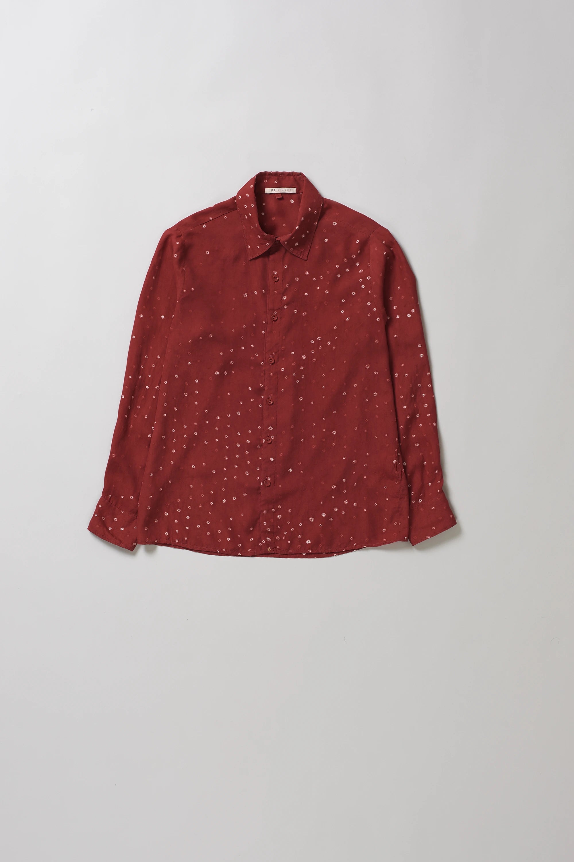 Front image of silk red bandhani shirt