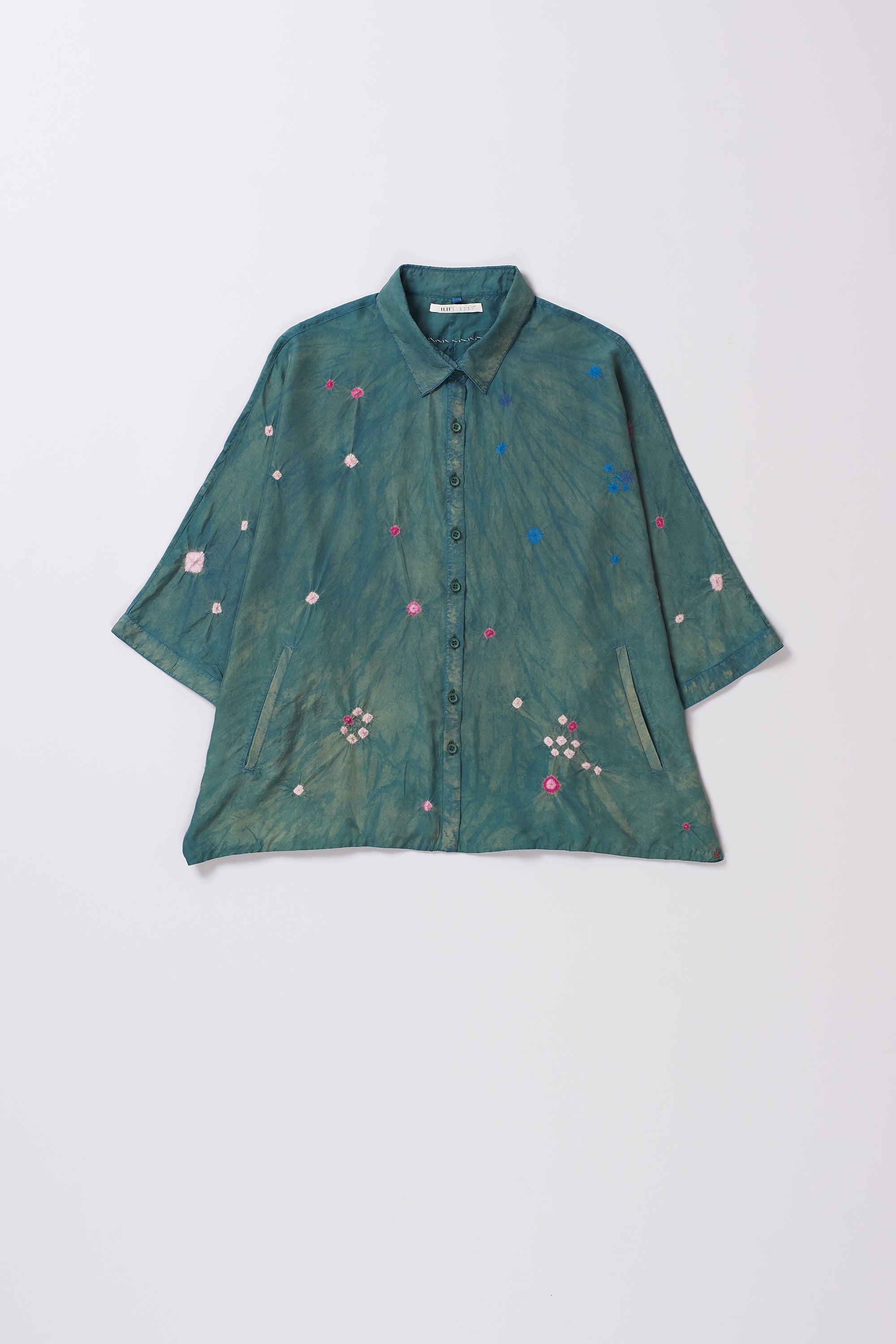 Green floral blouse