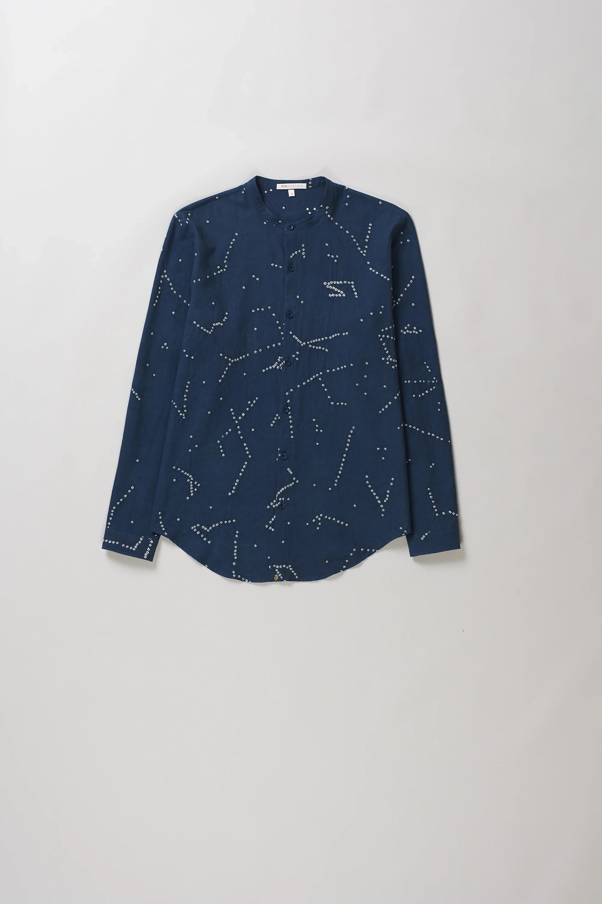 A space blue long-sleeve button-up shirt with an all-over white dotted constellation pattern.