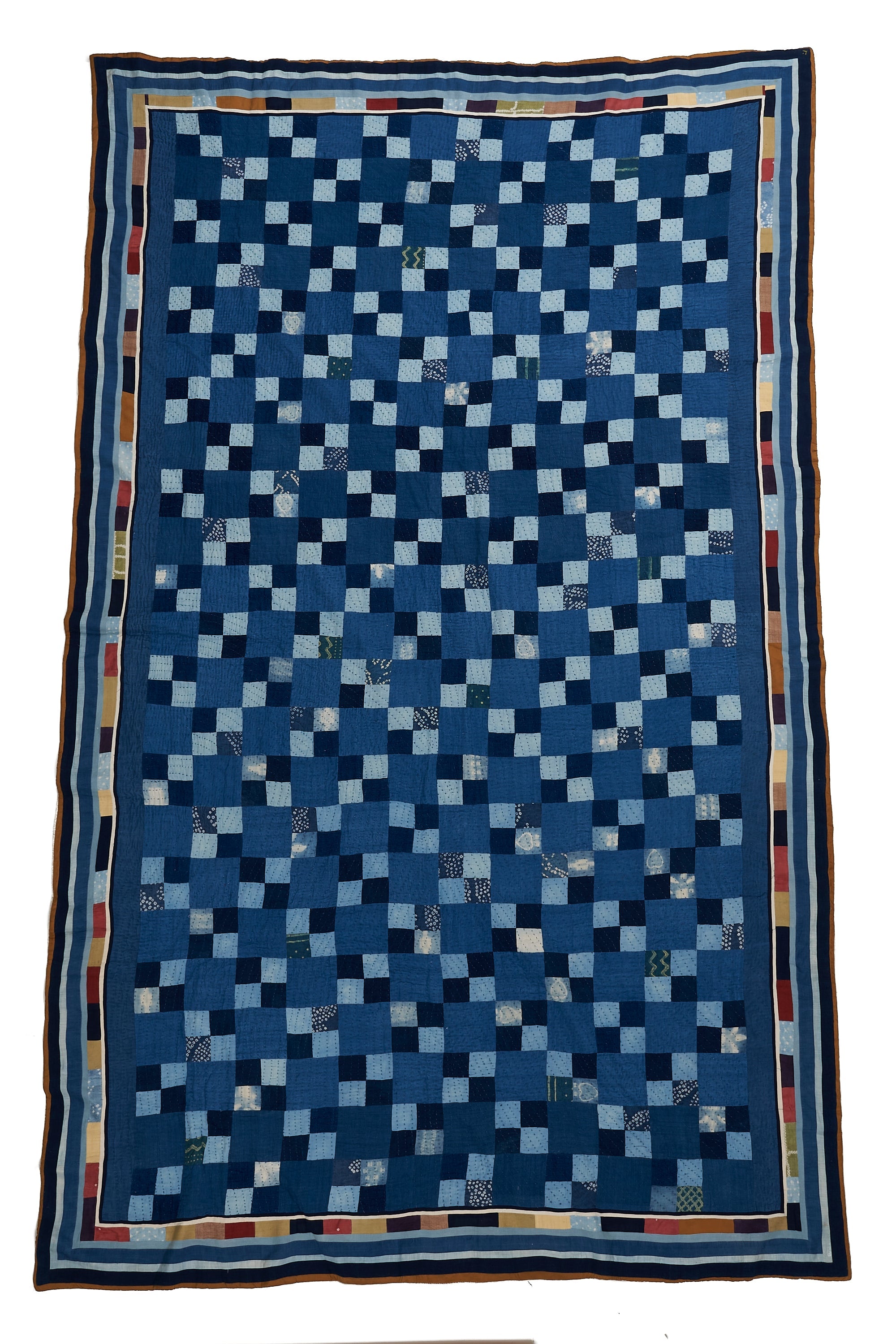 HAND EMBROIDERED PATCHWORK QUILT IN SHADES OF INDIGO