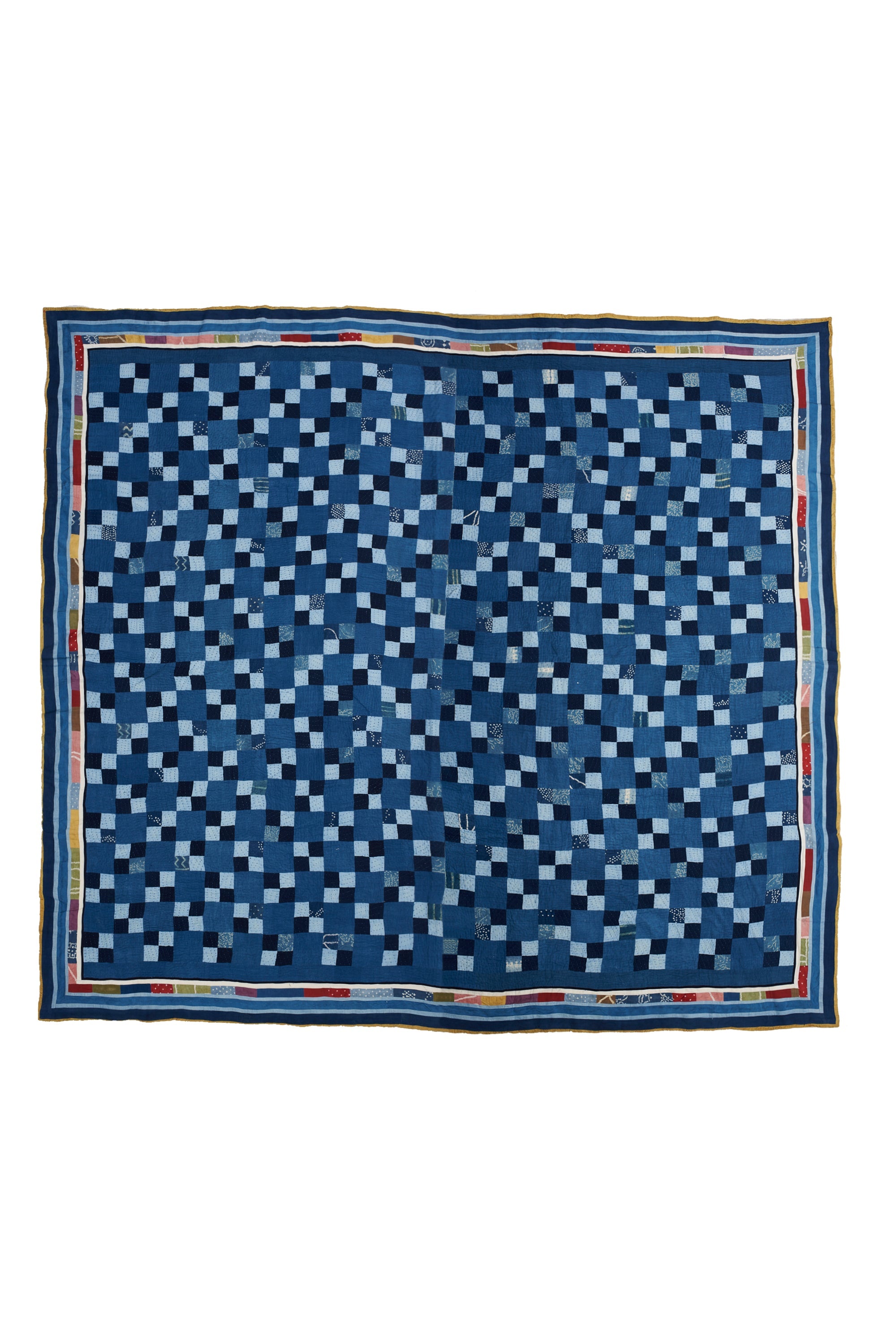 HAND EMBROIDERED PATCHWORK QUILT IN SHADES OF INDIGO