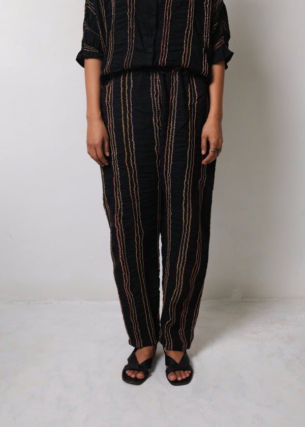 BLACK TROUSERS IN MULTI COLOURED BANDHANI STRIPES