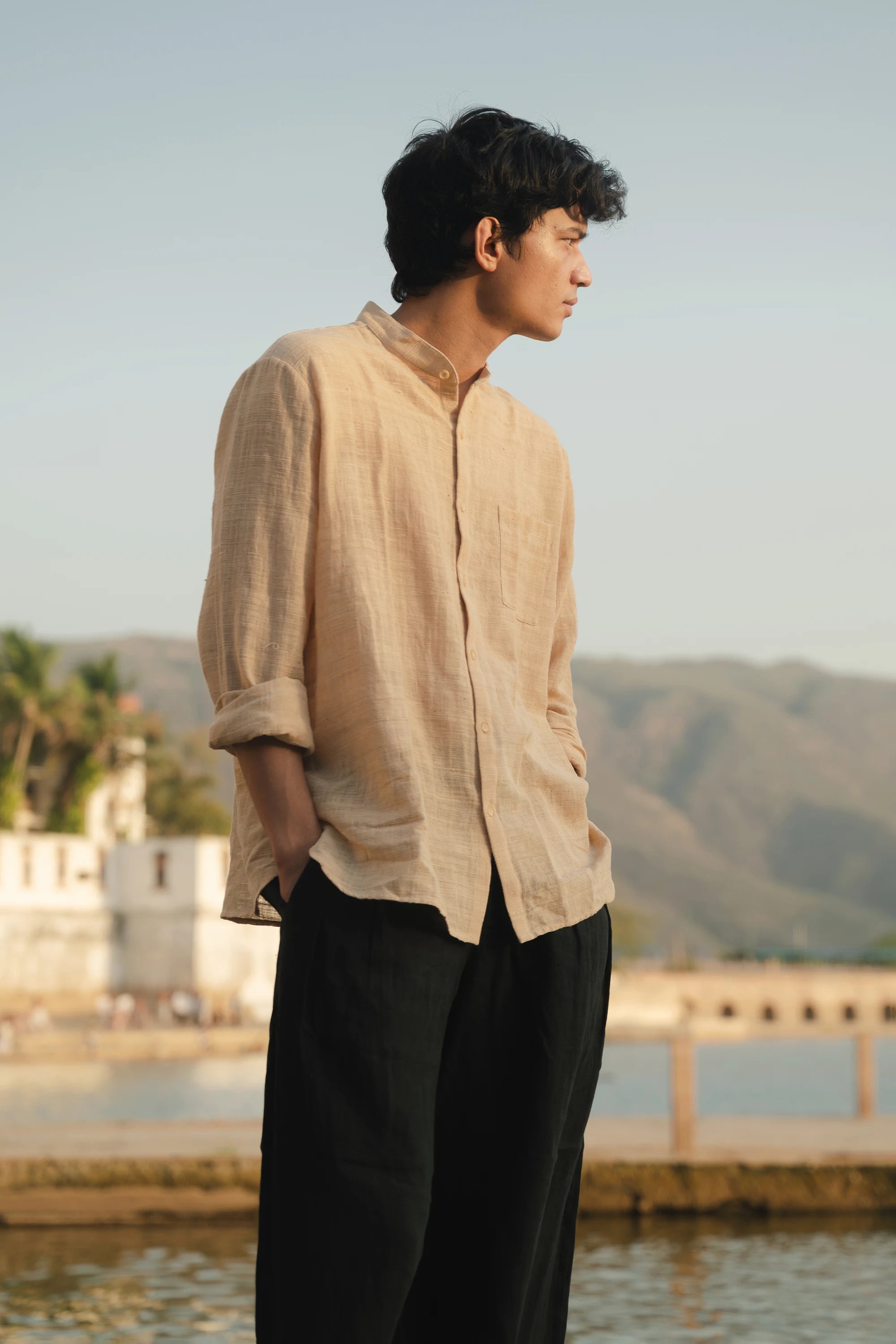 A man wearing ecru cotton shirt
