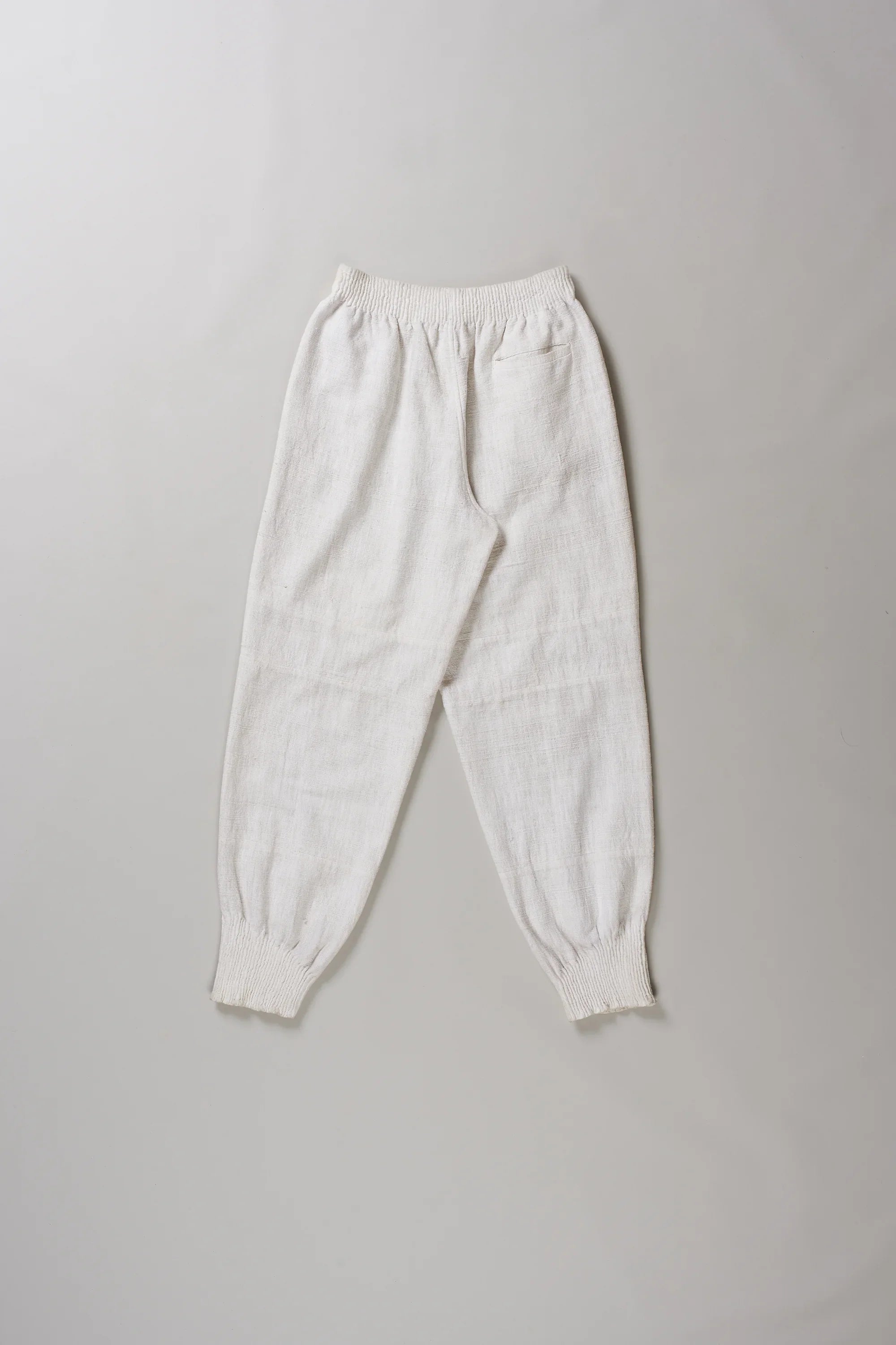 Back image of ecru cotton pant with pocket