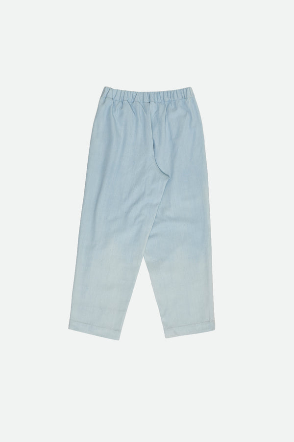 PLEATED TROUSERS IN LIGHT INDIGO DENIM