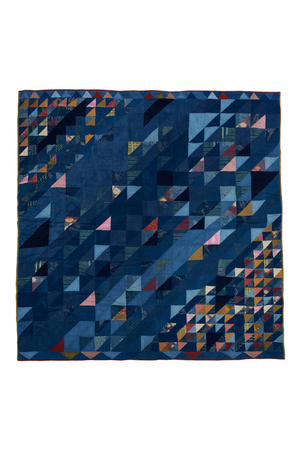 ANGULAR PATCHWORK QUILT IN SHADES OF INDIGO