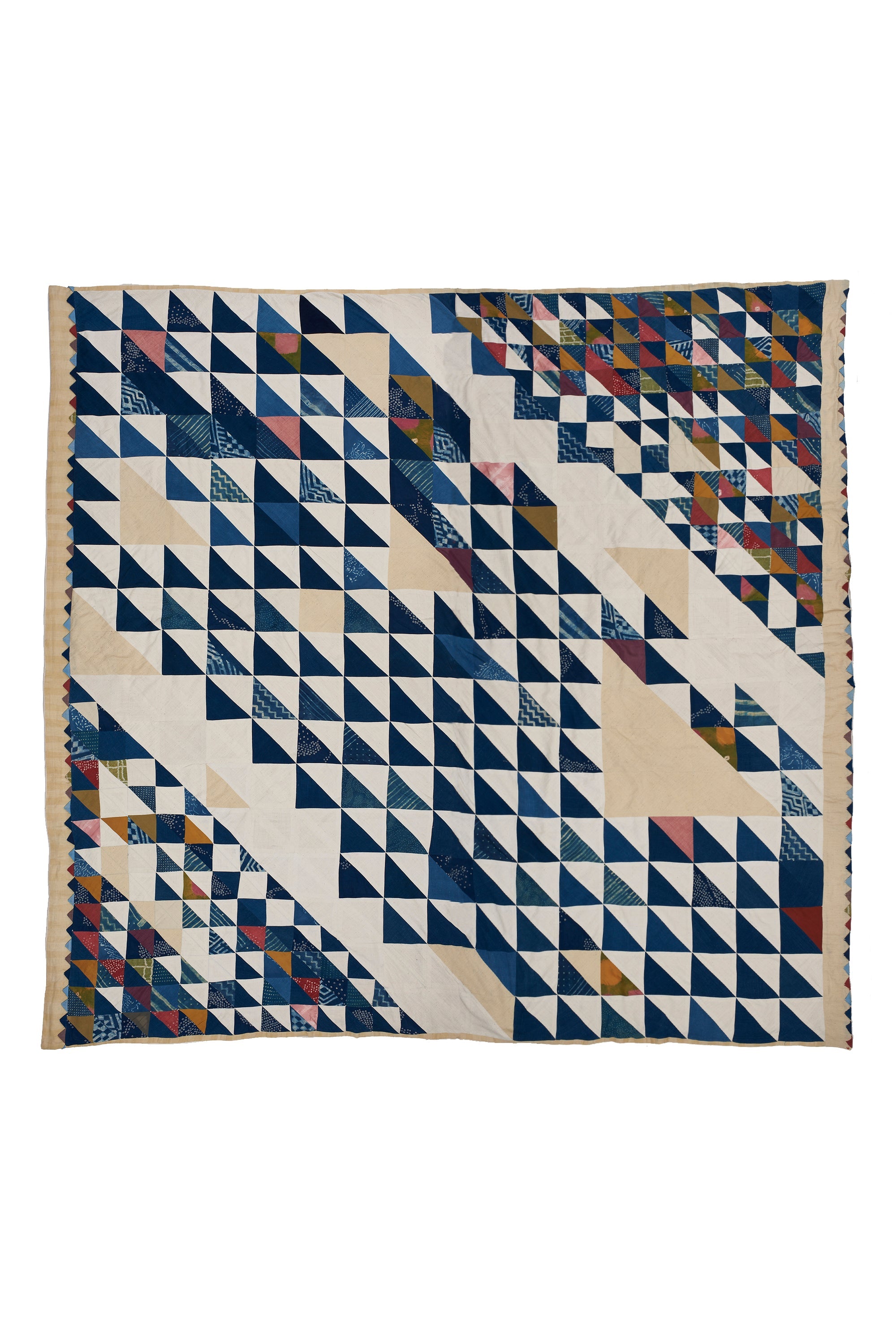 ANGULAR PATCHWORK QUILT IN SHADES OF ECRU AND INDIGO