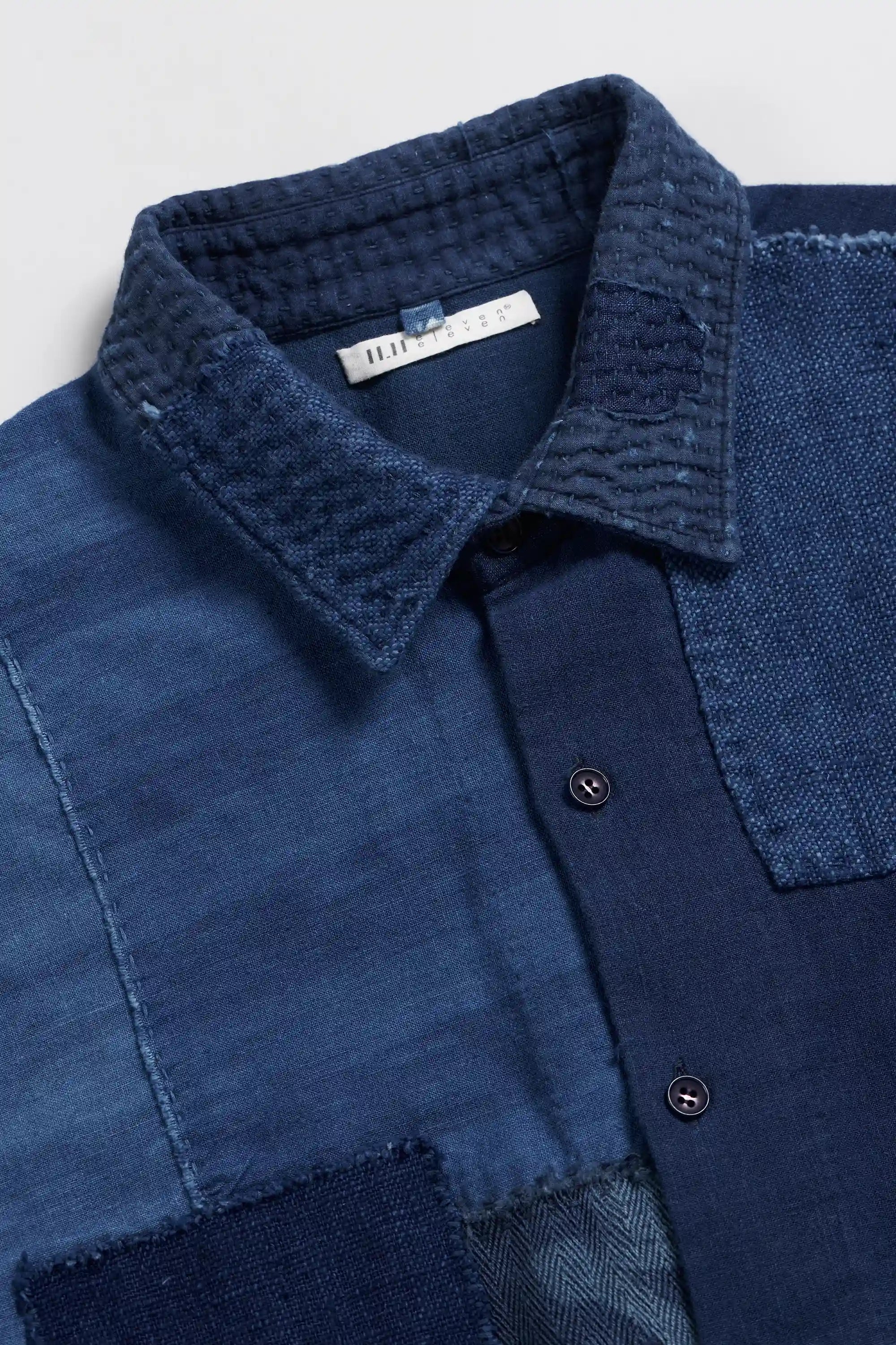 Fabric close-up with button.