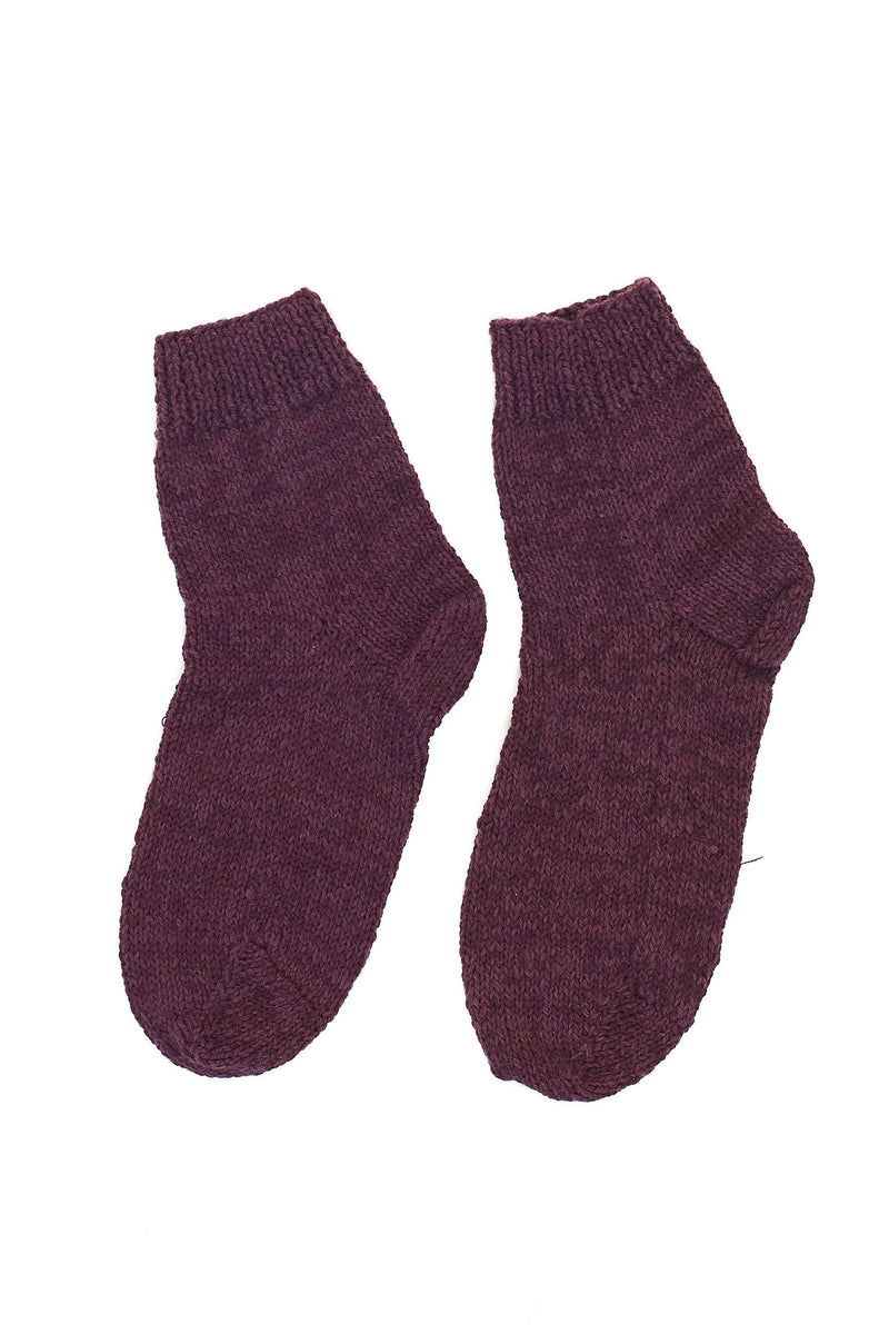 HAND-KNITTED PAIR OF SOCKS DYED IN PURPLE RED